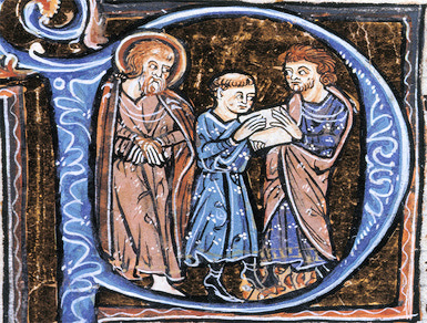 Three men standing together. The one in the center is handing a letter to the one on his left.