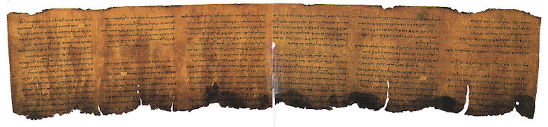 Photo of an ancient, unrolled, tattered scroll