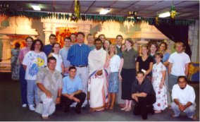 group photo of class members inside a Hindu temple