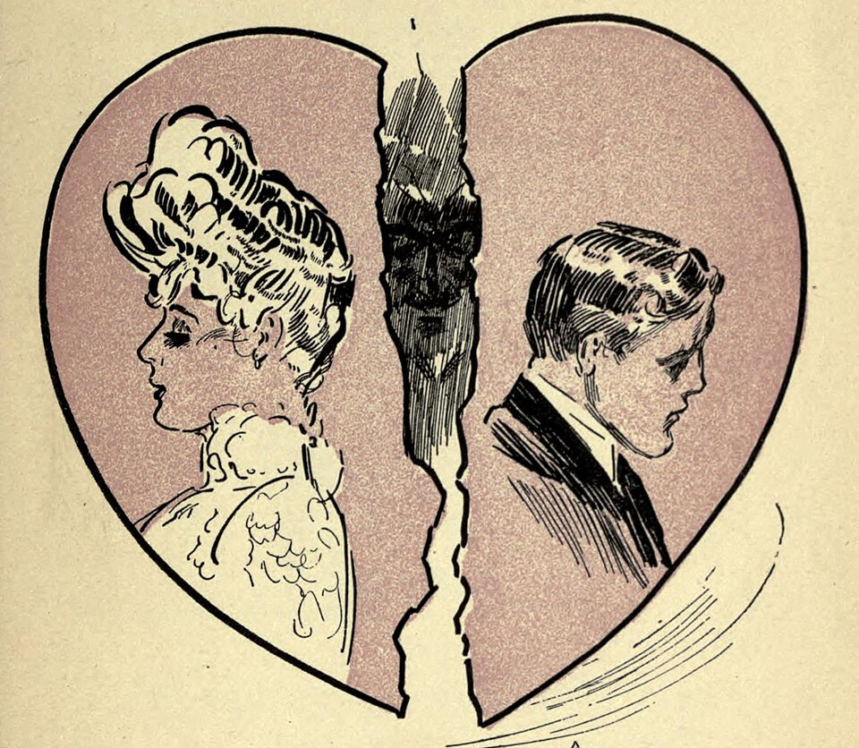 Heart broken in the middle with a woman's face on one side and a man's on the other