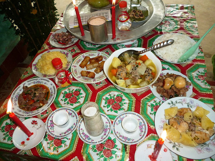 Plates of food offered in a Buddhist celebration