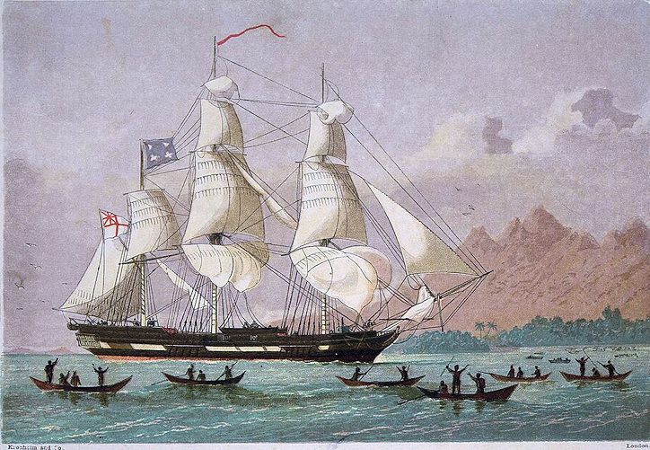 Three-masted sailing ship arriving in a harbor with several small canoes around it