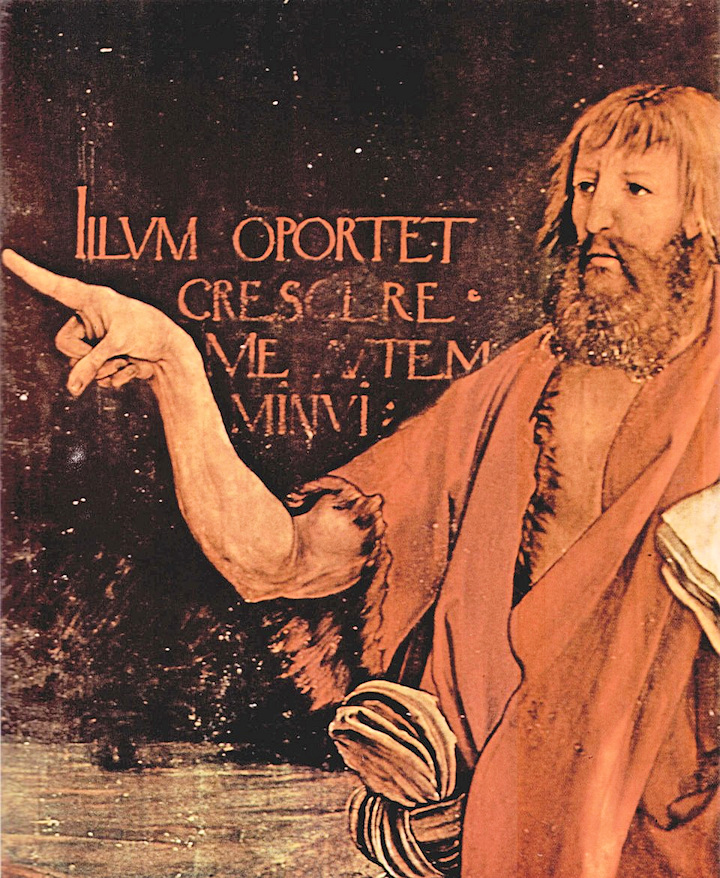 John the Baptist standing with arm outstretched and finger pointing