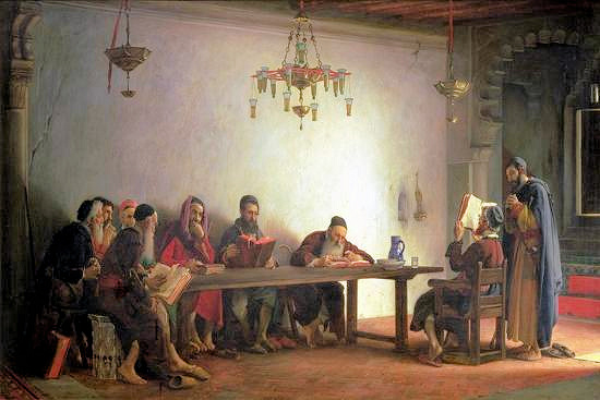 Rabbis around a table holding Bibles and reading them together