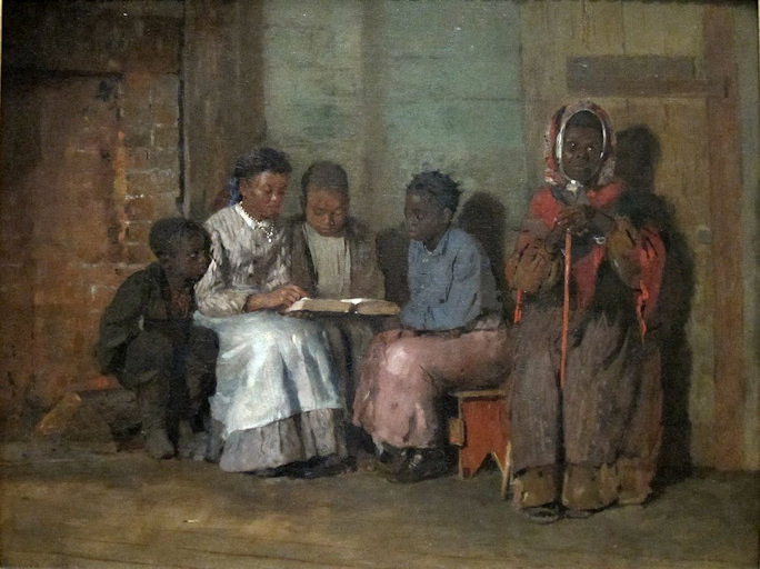 Children and youth listening to a woman read the Bible
