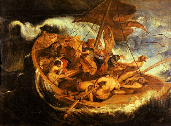 Small sailing boat with several people battling a fierce storm at sea