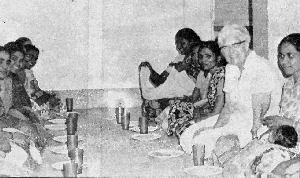 photo of people sitting at a
meal